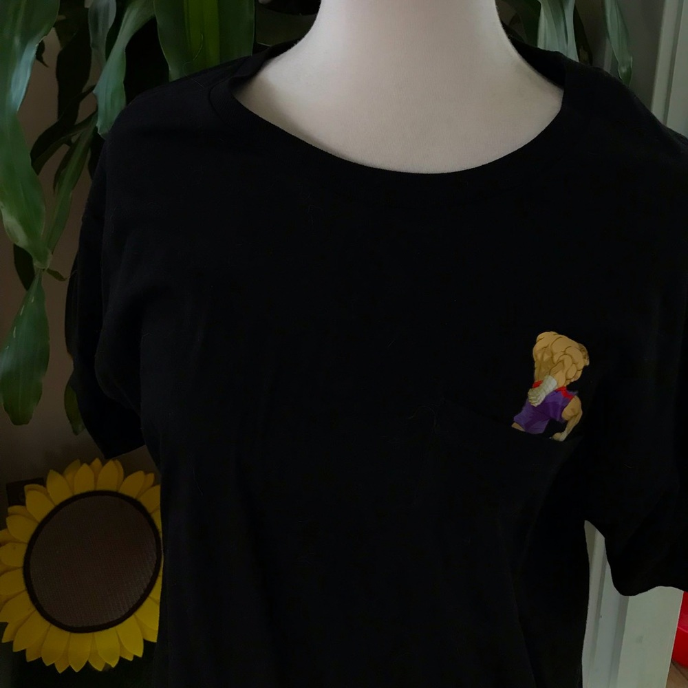 RARE Redbull shirt. Size X-Large. Black with animated character in pocket.